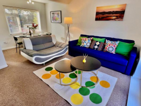 A vibrant 3-bedroom house with ample parking